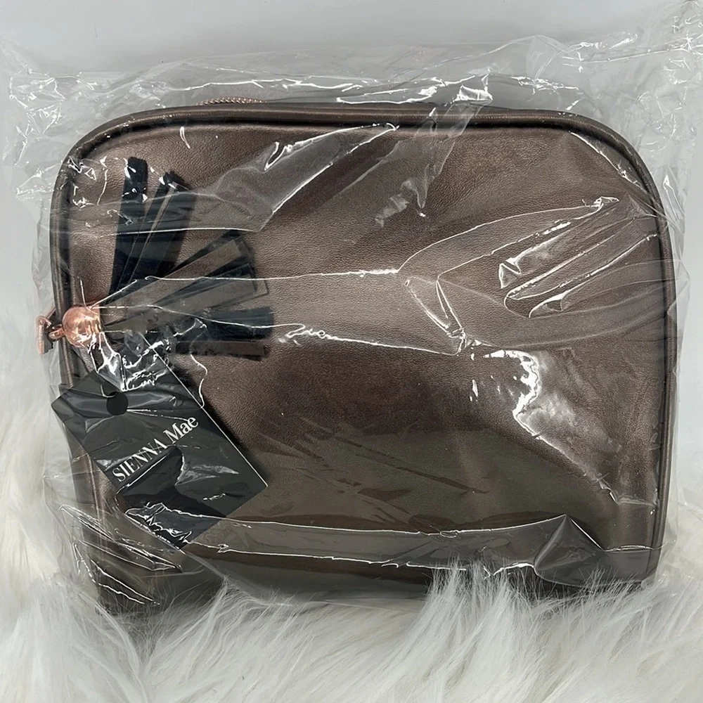 Sienna Mae Bronze Cosmetic Bag with Tassel New with tags!!